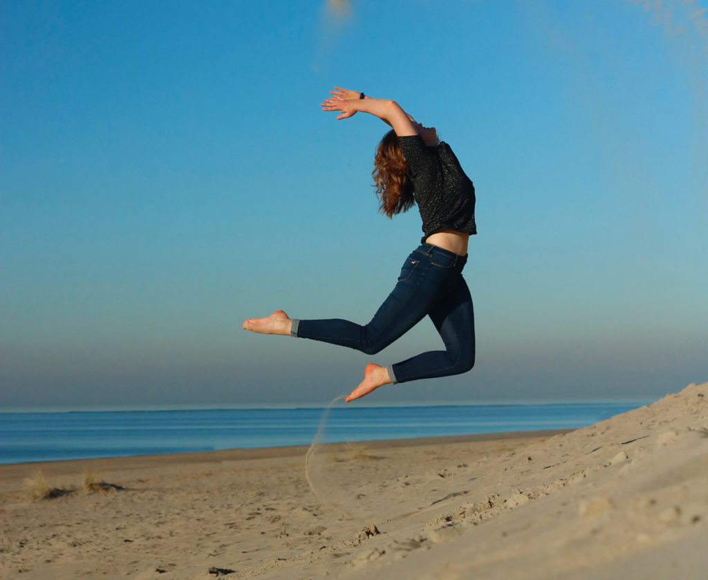 Jumping, Happy, Healthy, Energetic Female